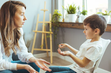 supportive teacher talking to student