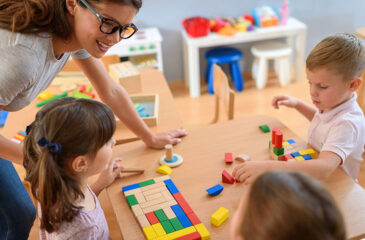 kindergarten kids in class with teacher