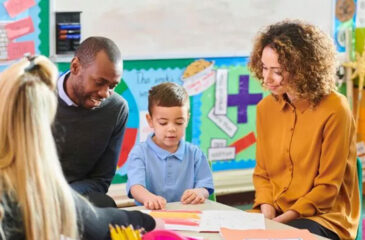 parents and child meeting with teacher