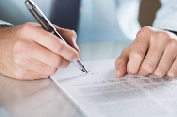 person signing document